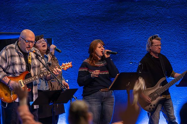 worship team leading on stage